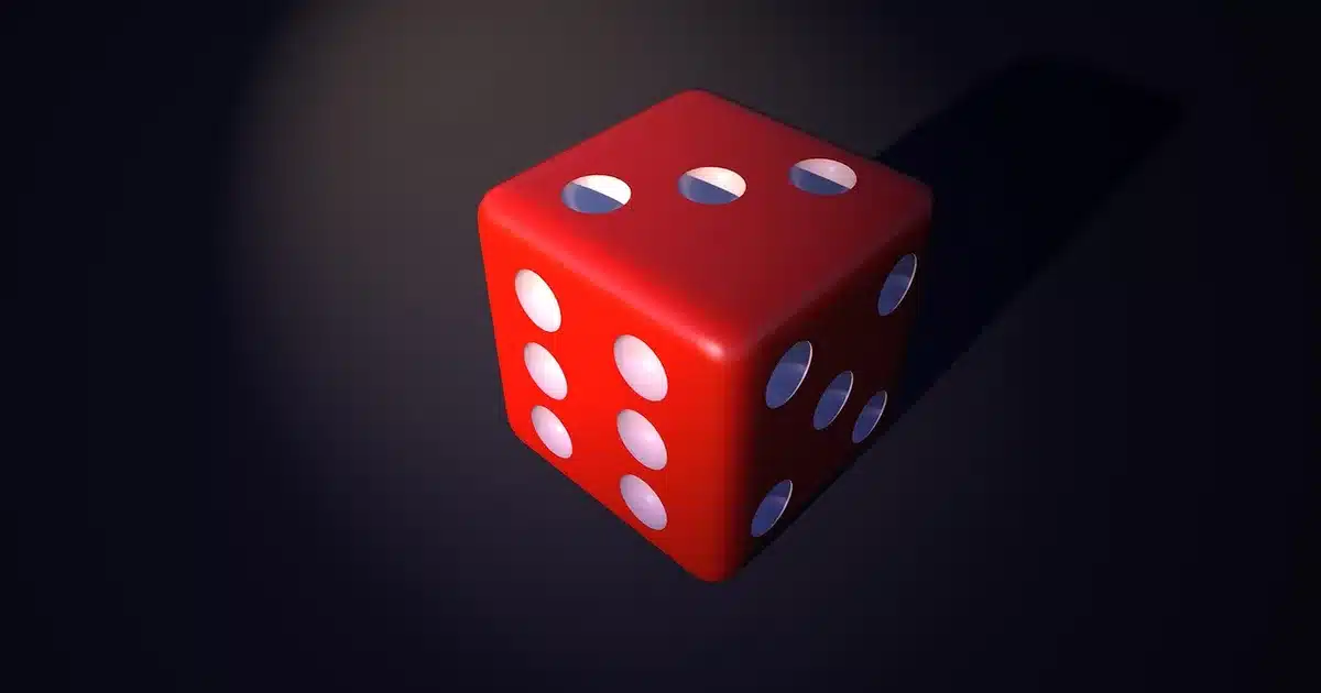 Mano che sfoglia una libreria di giochi su uno schermo